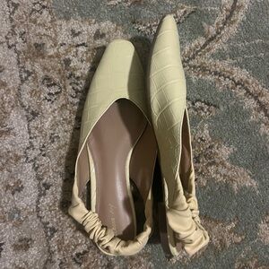 Pointed toe yellow flats